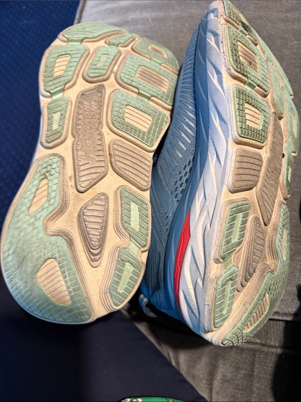 Hoka Men's Light Blue Athletic Running Shoes with Red Accent
